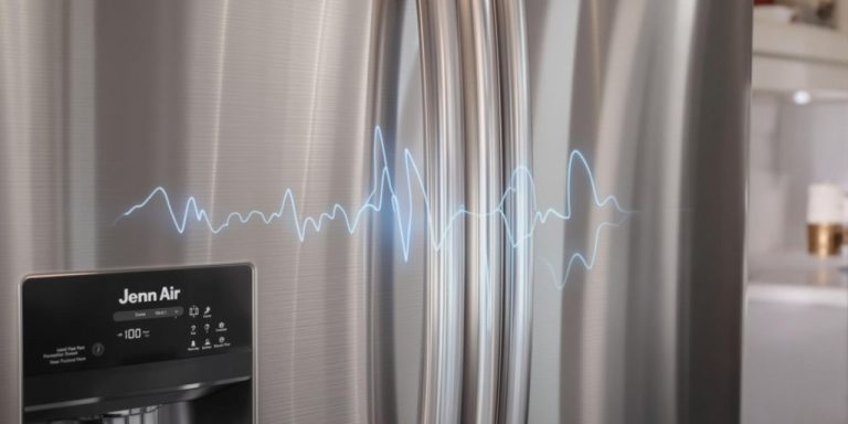 A stainless steel refrigerator featuring a sound wave design on its door, showcasing modern aesthetics and functionality.